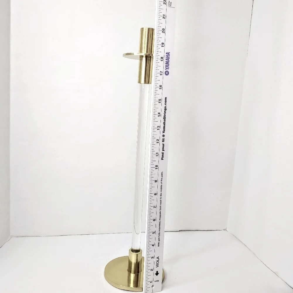 Creative Co-op tall acrylic/gold taper candle holder.